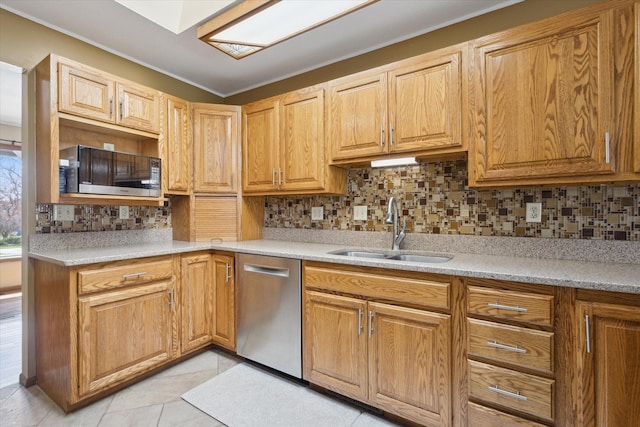 6030 Paw Paw Lake Rd, Coloma, MI 49038 - kitchen with a sink, stainless steel appliances, tasteful backsplash, and light tile patterned flooring