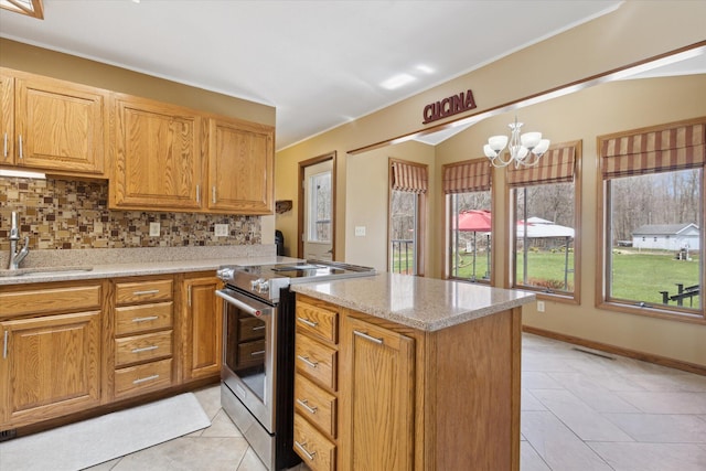 6030 Paw Paw Lake Rd, Coloma, MI 49038 - kitchen featuring stainless steel electric stove, backsplash, a chandelier, and light tile patterned floors