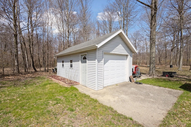 6030 Paw Paw Lake Rd, Coloma, MI 49038 - detached garage featuring asphalt driveway