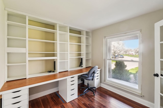 4658 White Pine Ct, Ypsilanti, MI 48197 - office space with built in study area, baseboards, and dark wood-style flooring