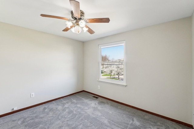 4658 White Pine Ct, Ypsilanti, MI 48197 - carpeted spare room with baseboards, a ceiling fan, and visible vents