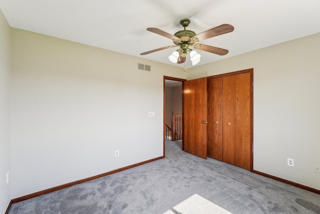 4658 White Pine Ct, Ypsilanti, MI 48197 - unfurnished bedroom with visible vents, a closet, baseboards, carpet flooring, and ceiling fan