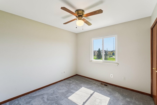 4658 White Pine Ct, Ypsilanti, MI 48197 - carpeted empty room featuring visible vents, a ceiling fan, and baseboards