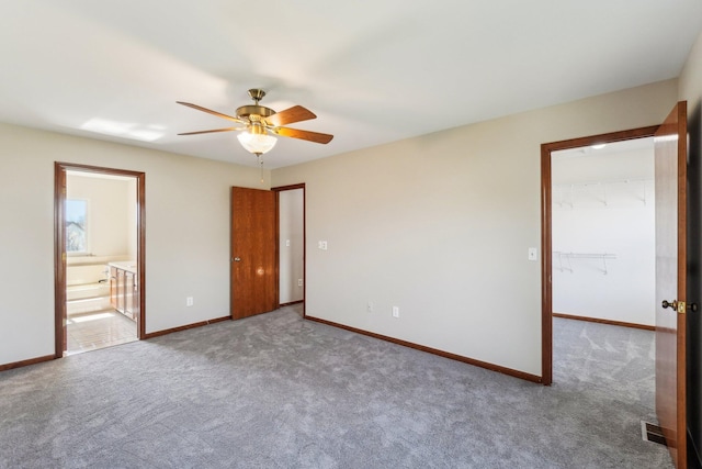 4658 White Pine Ct, Ypsilanti, MI 48197 - carpeted empty room featuring ceiling fan, baseboards, and visible vents