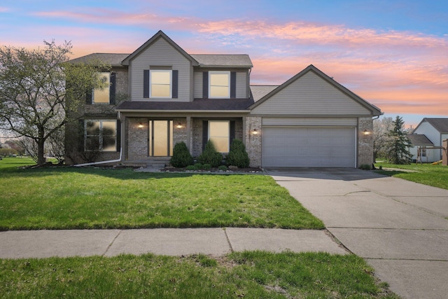 4658 White Pine Ct, Ypsilanti, MI 48197 - traditional-style home featuring brick siding, an attached garage, a front yard, and concrete driveway