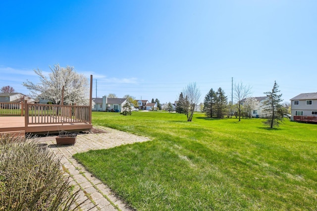 4658 White Pine Ct, Ypsilanti, MI 48197 - view of yard with a residential view, a patio area, and a deck