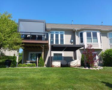 935 Stony Lake Ct, Oxford, MI 48371 - back of house featuring a lawn and a balcony