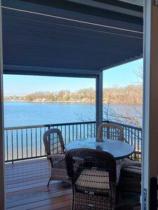 935 Stony Lake Ct, Oxford, MI 48371 - wooden terrace with a water view