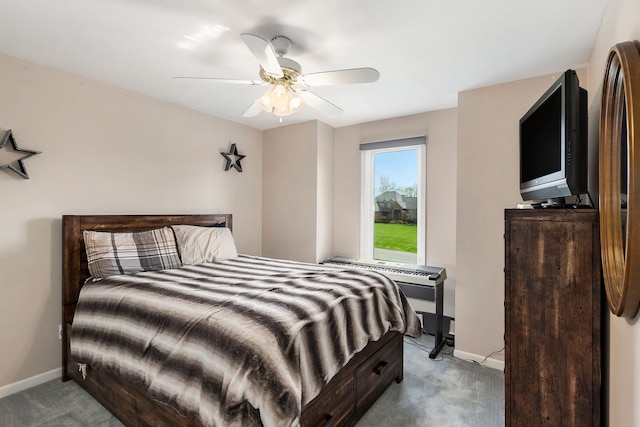 bedroom with baseboards, a ceiling fan, and light colored carpet