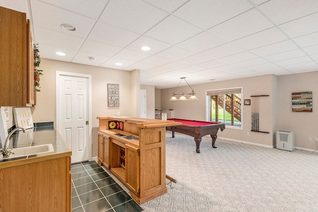 game room featuring baseboards, a sink, a drop ceiling, and pool table