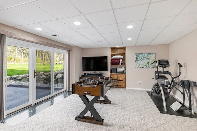 exercise area with recessed lighting and baseboards