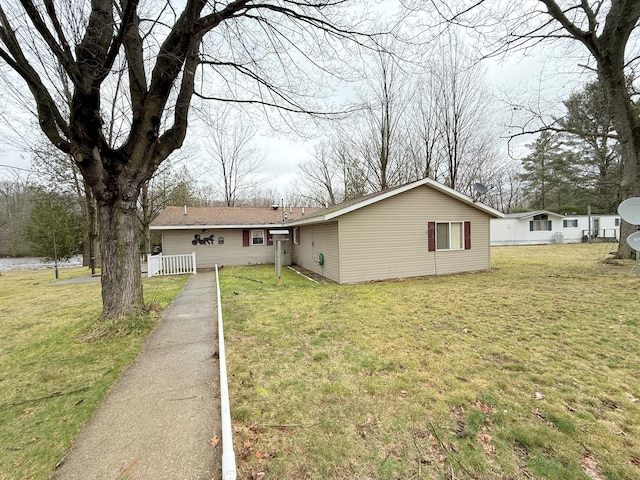 15370 Rapids Dr, Hersey, MI 49639 - ranch-style home with a front yard