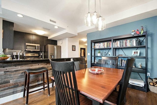 27 Library St NE Unit 601, Grand Rapids, MI 49503 - dining area with wood finished floors and recessed lighting