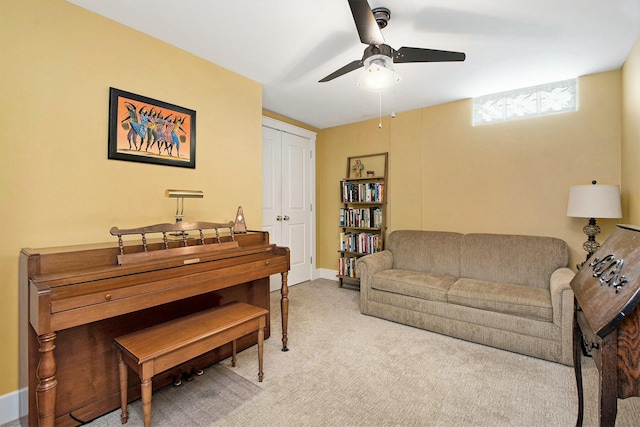 27 Library St NE Unit 601, Grand Rapids, MI 49503 - living room featuring a ceiling fan and carpet flooring