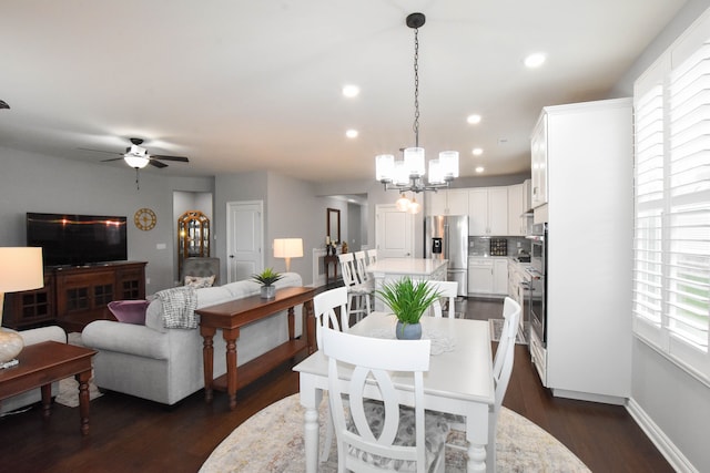 4336 Silica Dr, Lake Orion, MI 48359 - dining room featuring a wealth of natural light, recessed lighting, dark wood-style flooring, and ceiling fan with notable chandelier