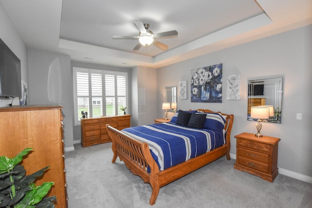 4336 Silica Dr, Lake Orion, MI 48359 - bedroom featuring baseboards, a ceiling fan, a raised ceiling, and light carpet