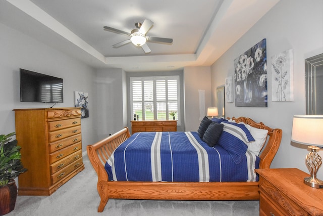 4336 Silica Dr, Lake Orion, MI 48359 - bedroom with ceiling fan, a tray ceiling, and carpet flooring