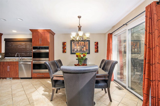 28909 Hidden Trl, Farmington Hills, MI 48331 - dining space with a chandelier, recessed lighting, and light tile patterned floors