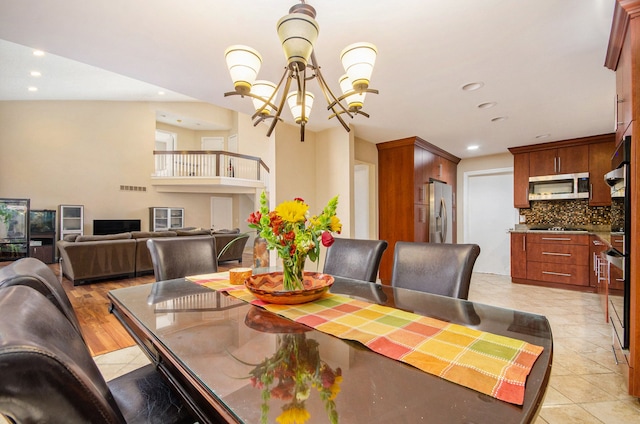 28909 Hidden Trl, Farmington Hills, MI 48331 - dining area featuring a chandelier, recessed lighting, and light tile patterned floors