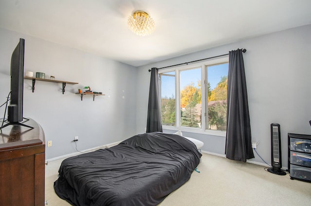 28909 Hidden Trl, Farmington Hills, MI 48331 - bedroom featuring carpet floors, baseboards, and a chandelier