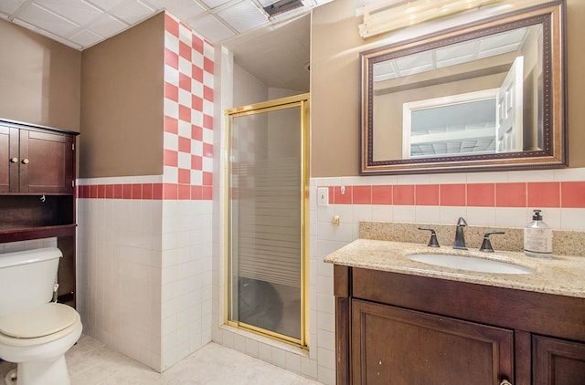 28909 Hidden Trl, Farmington Hills, MI 48331 - full bath featuring tile walls, a stall shower, toilet, tile patterned flooring, and vanity