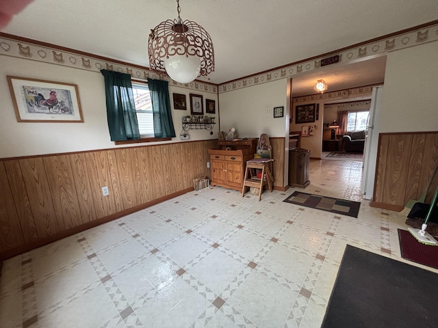 1026 Lakeview Dr, Brooklyn, MI 49230 - dining space featuring wood walls and wainscoting
