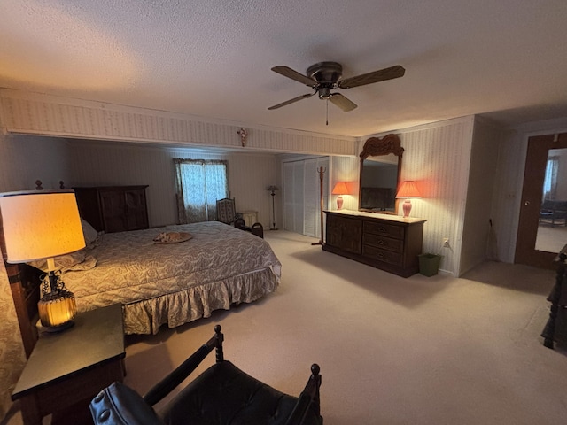 1026 Lakeview Dr, Brooklyn, MI 49230 - bedroom featuring ceiling fan, a textured ceiling, and light carpet