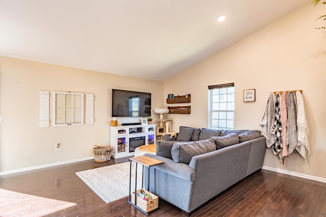 1242 Bay, Holly, MI 48442 - living room featuring recessed lighting, baseboards, dark wood-style floors, and high vaulted ceiling