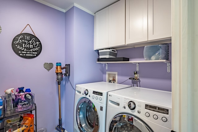 1242 Bay, Holly, MI 48442 - laundry area with crown molding, cabinet space, and independent washer and dryer