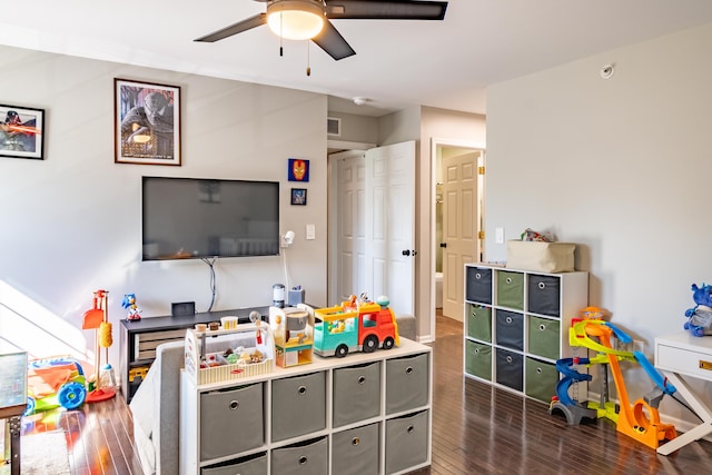 1242 Bay, Holly, MI 48442 - playroom with a ceiling fan and wood finished floors