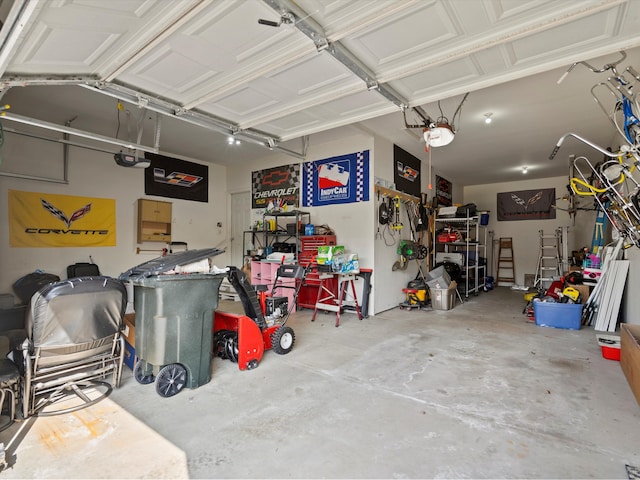 garage featuring a garage door opener