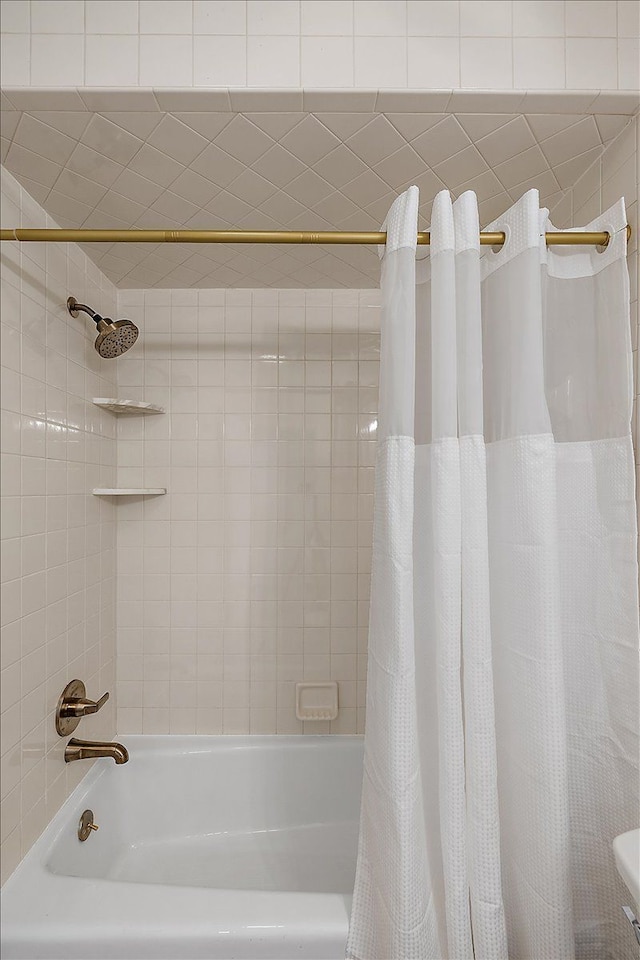 full bathroom with shower / bath combo