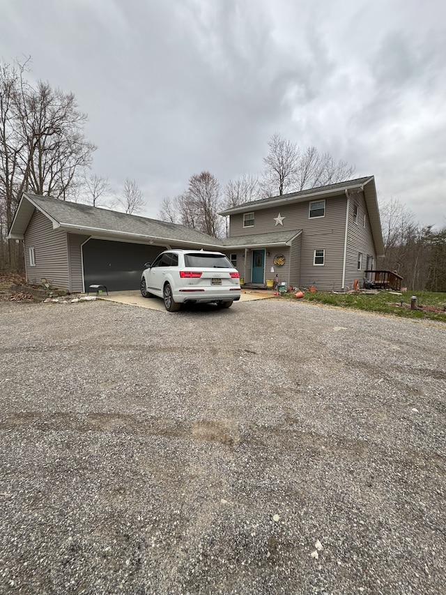 view of front of home featuring an attached garage and driveway