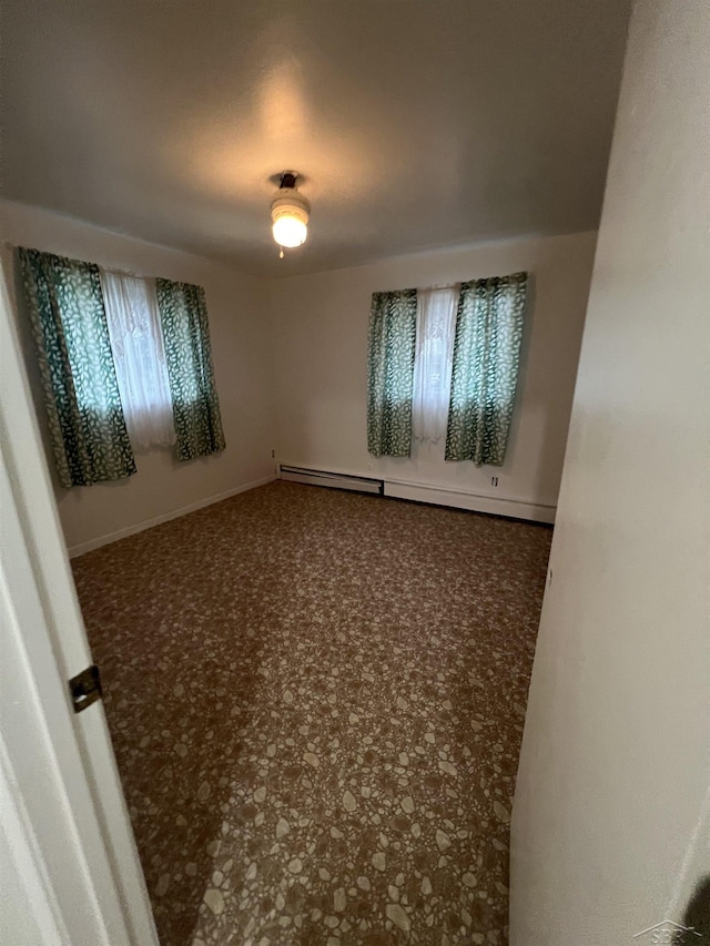 3197 Studor Rd, Saginaw, MI 48601 - spare room with baseboard heating