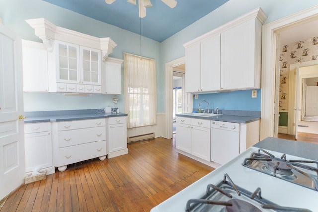 11811 Laird Rd, Brooklyn, MI 49230 - kitchen with a baseboard heating unit, hardwood / wood-style flooring, white cabinets, and white dishwasher