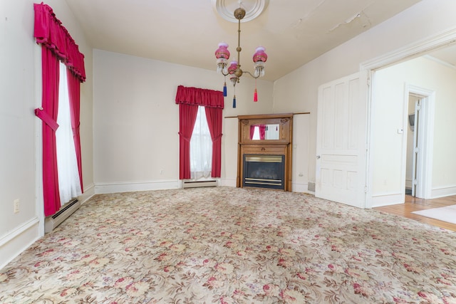 11811 Laird Rd, Brooklyn, MI 49230 - unfurnished living room with a fireplace, a baseboard radiator, a baseboard heating unit, and baseboards