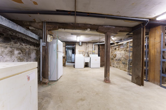 11811 Laird Rd, Brooklyn, MI 49230 - unfinished basement with a sink, freestanding refrigerator, and washer and clothes dryer