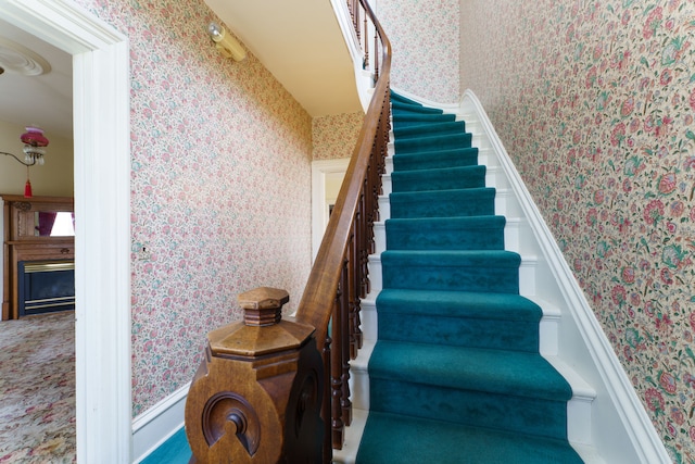 11811 Laird Rd, Brooklyn, MI 49230 - stairway with a fireplace and wallpapered walls