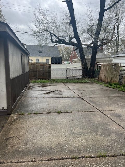19676 Kingsville St, Harper Woods, MI 48225 - exterior space featuring fence and a patio