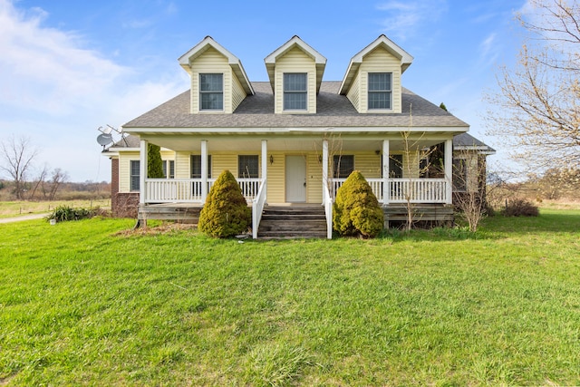 5580 Hegel Rd, Goodrich, MI 48438 - view of front of property featuring a porch, a shingled roof, and a front yard