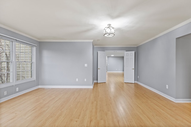 5580 Hegel Rd, Goodrich, MI 48438 - empty room with baseboards, ornamental molding, and light wood finished floors