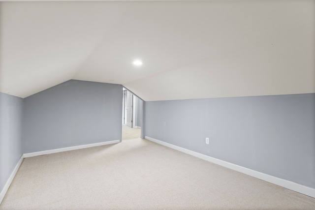5580 Hegel Rd, Goodrich, MI 48438 - bonus room featuring recessed lighting, baseboards, lofted ceiling, and carpet floors