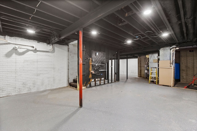 5580 Hegel Rd, Goodrich, MI 48438 - unfinished below grade area featuring water heater