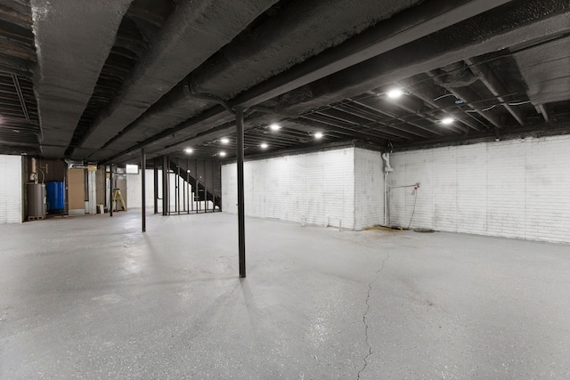 5580 Hegel Rd, Goodrich, MI 48438 - unfinished basement with gas water heater