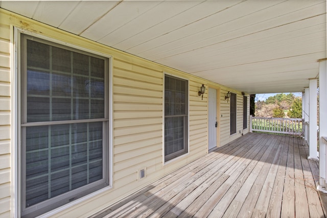 5580 Hegel Rd, Goodrich, MI 48438 - wooden deck with covered porch