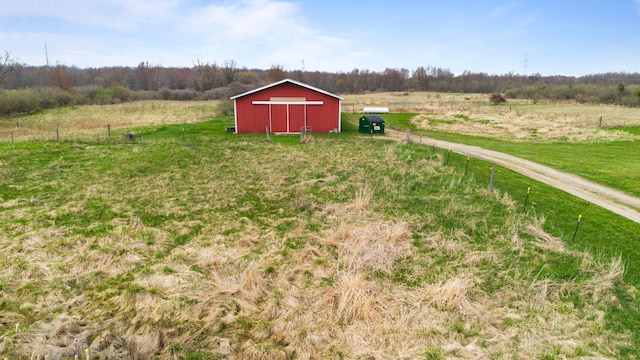 5580 Hegel Rd, Goodrich, MI 48438 - view of yard with a rural view and an outbuilding