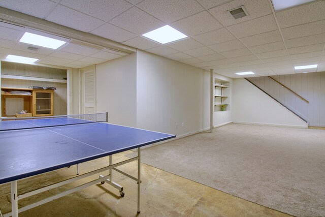 recreation room with baseboards, visible vents, carpet flooring, and a paneled ceiling
