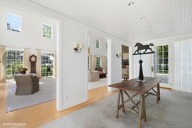 sunroom / solarium featuring a healthy amount of sunlight