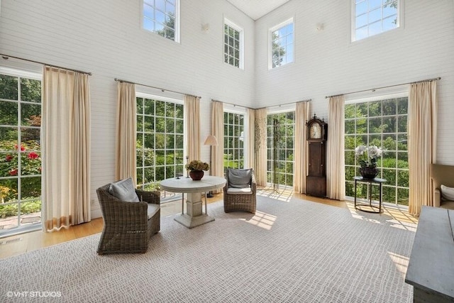 sunroom / solarium with wood finished floors
