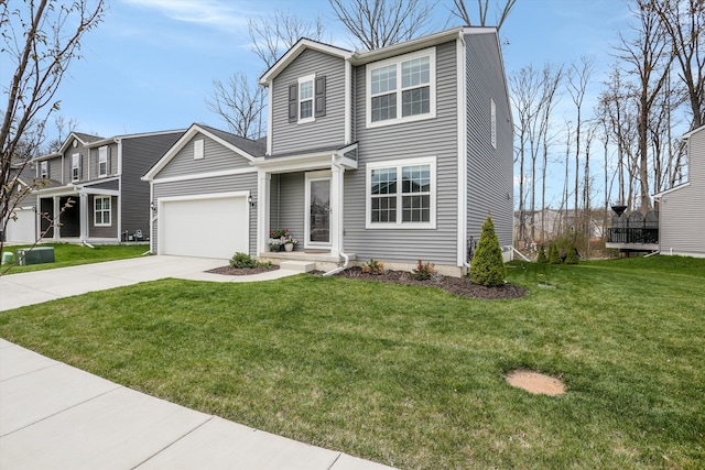 traditional-style house with a garage, driveway, and a front yard